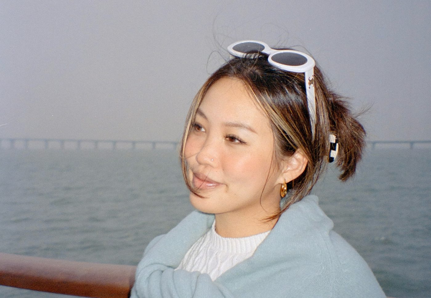 Hailey in profile by the water, 35mm film